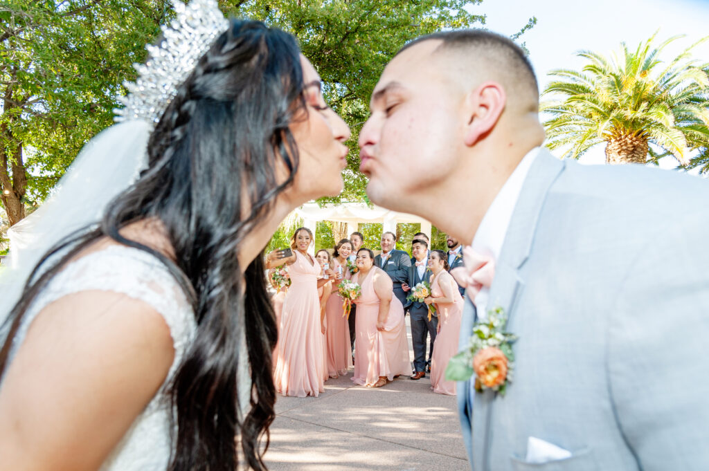 bride & groom kissing, bridal party, emerald at queensridge