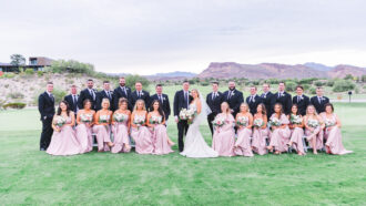 bridal party posed on a golf course at bears best golf club las vegas