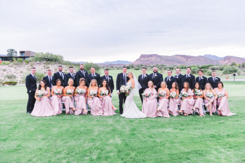 bridal party posed on a golf course at bears best golf club las vegas