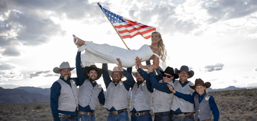 Wedding party celebrates with the bride at Kenzie and Dane's Alamo Nevada wedding