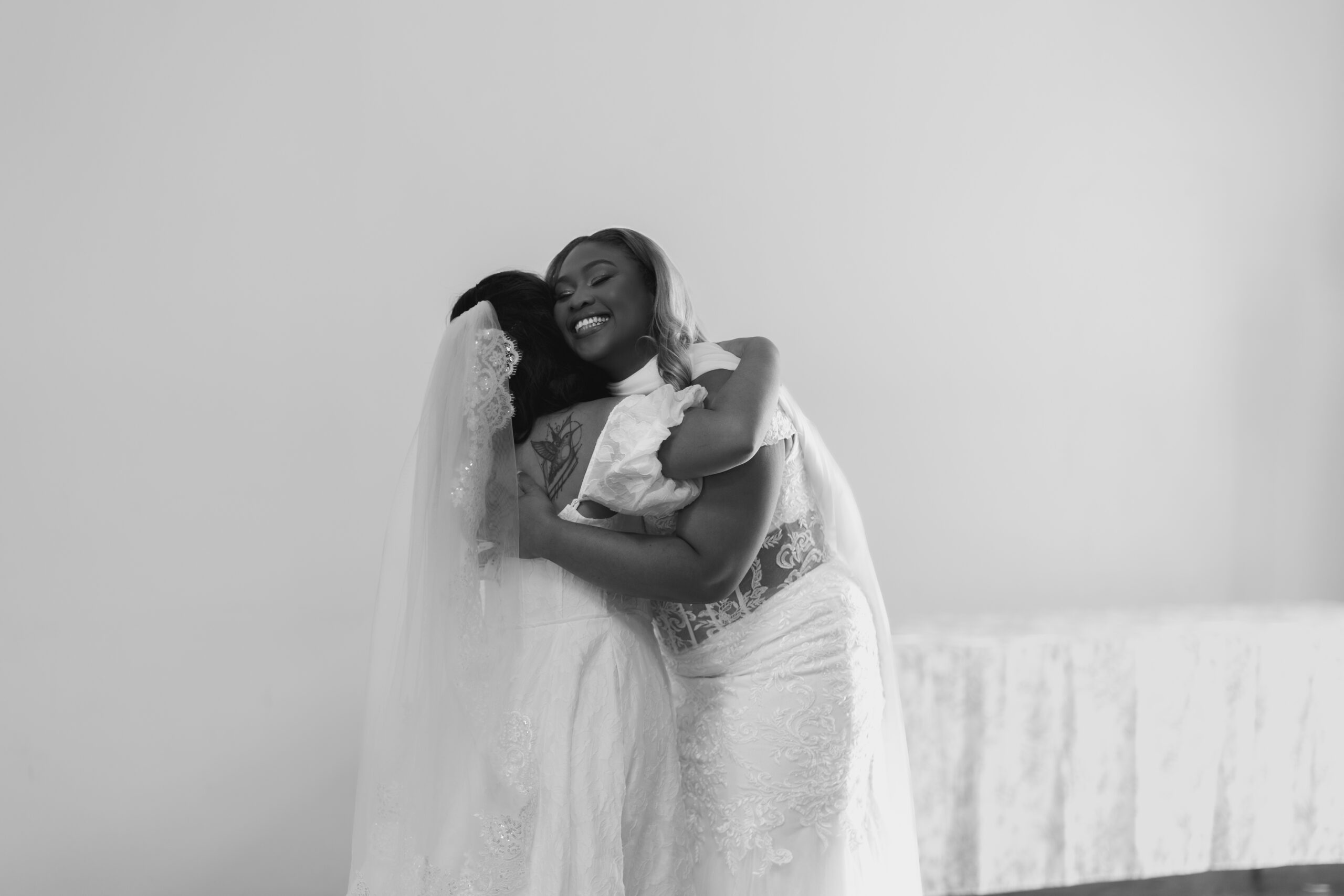 Sharmaine and Angel embrace during their wedding video filmed by Las Vegas wedding videographers at The Doyle