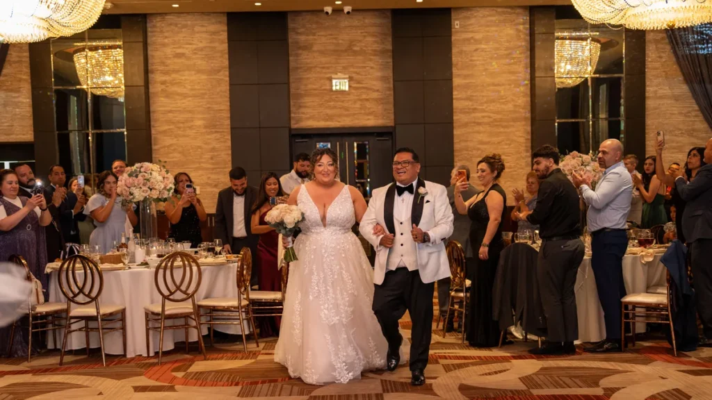 Bride Armine and groom Carlos grand entrance into Fabrizio Banquet Hall wedding reception in Las Vegas